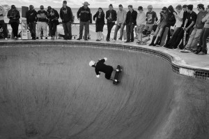 A person skateboarding in a skate park By: Marc Dalmulder
