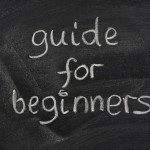 guide for beginners title handwritten with white chalk on a blackboard